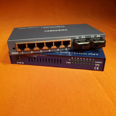 Mini switch (2x100fx mm2km) + 6tp port (v-lan) web managed